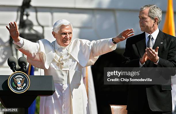 Pope Benedict XVI waves to the crowd as he joins U.S. President George W. Bush in an arrival ceremony on the South Lawn at the White House April 16,...