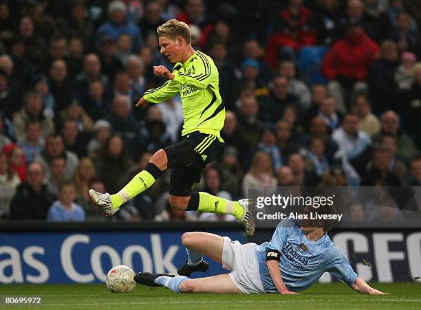 Morten Nielsen of Chelsea is tackled by Ben Mee of Manchester City during the FA Youth Cup Final 2nd Leg match between Manchester City and Chelsea at...