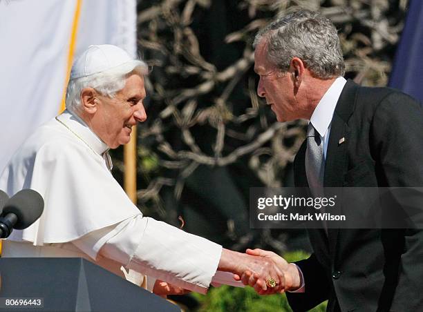 President George W. Bush shakes hands with Pope Benedict XVI during an arrival ceremony on the South Lawn of the White House, April 16, 2008 in...