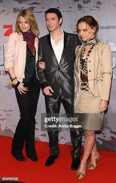 Model Eva Padberg, producer Sascha Schwingel and actress Catherine Flemming attend the "Unschuldig" TV series premiere on April 16, 2008 in Berlin,...