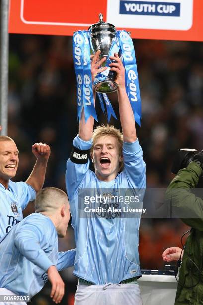 Ben Mee, the captain of Manchester City, lifts the FA Youth Cup after victory over Chelsea in the FA Youth Cup Final 2nd Leg match between Manchester...
