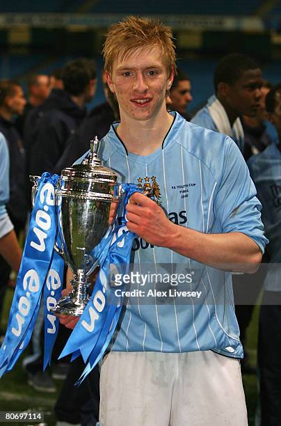 Ben Mee, the captain of Manchester City, holds the FA Youth Cup after victory over Chelsea in the FA Youth Cup Final 2nd Leg match between Manchester...