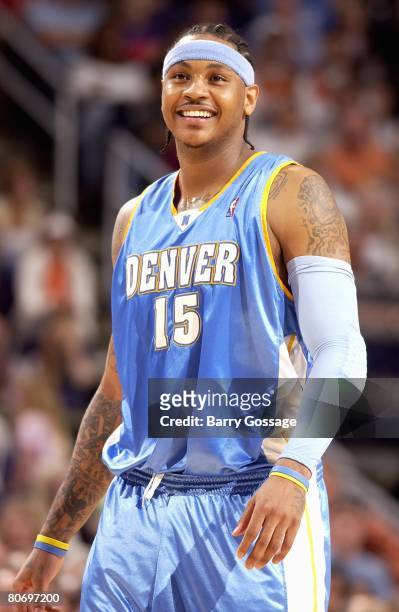 Carmelo Anthony of the Denver Nuggets smiles during the game against the Phoenix Suns on March 31, 2008 at US Airways Center in Phoenix, Arizona. The...