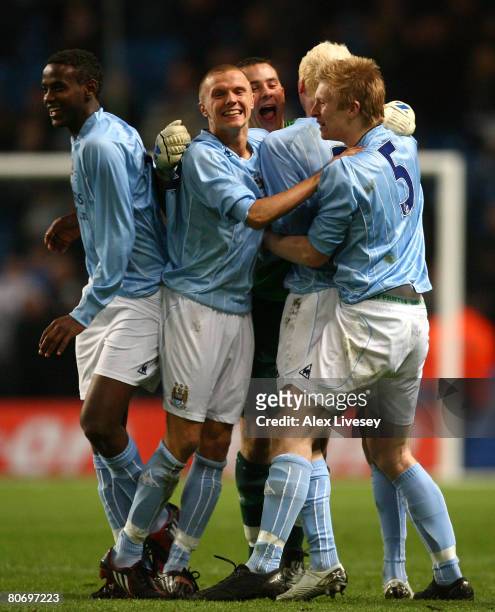 Manchester City players celebrate after victory over Chelsea in the FA Youth Cup Final 2nd Leg match between Manchester City and Chelsea at the City...