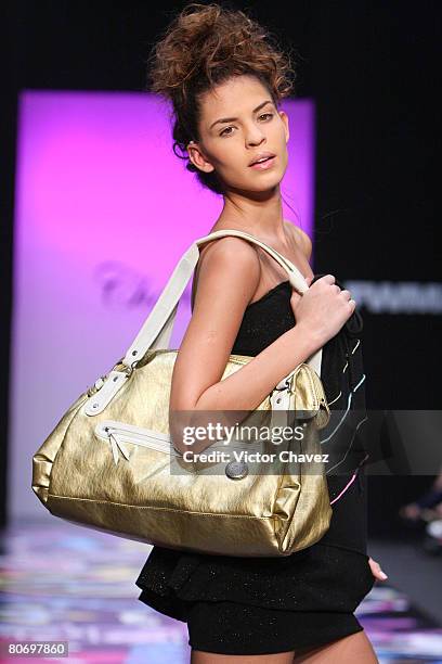 Model walks down the catwalk wearing Chabe by Laura Carrillo during Fashion Week Mexico Autumn/Winter 2008 at Centro Cultural Estacion Indianilla on...