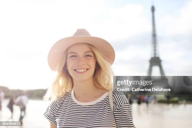 a young woman in paris - close up of beautiful young blonde woman with black hat stock pictures, royalty-free photos & images