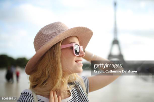 a young woman in paris - close up of beautiful young blonde woman with black hat stock pictures, royalty-free photos & images