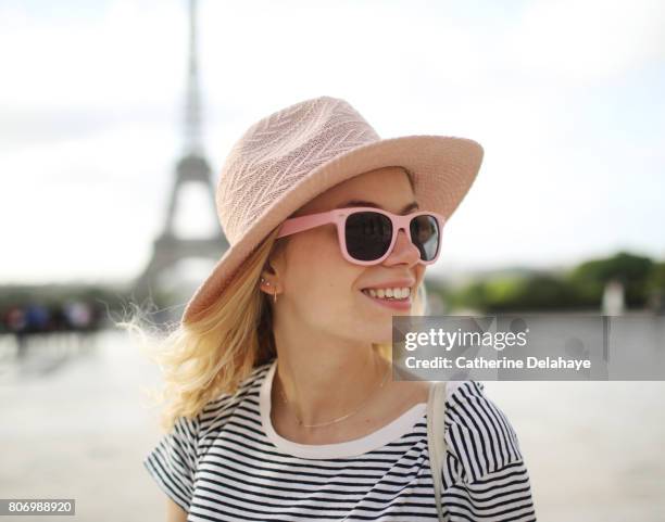 a young woman in paris - close up of beautiful young blonde woman with black hat stock pictures, royalty-free photos & images