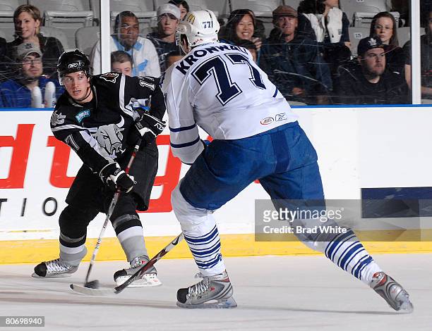 Staffan Kronwall of the Toronto Marlies battles for the puck with David Spina of the San Antonio Rampage April 16, 2007 at the Ricoh Coliseum in...