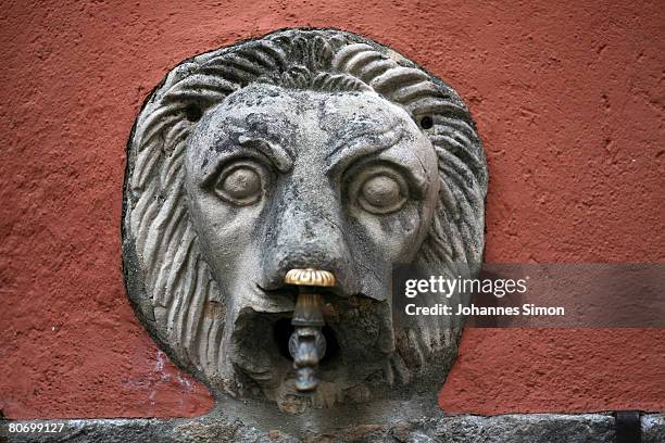 An antique font, designed as a lion's head is seen in downtown Ascona on April 16 in Ascona, Switzerland. The German football national team will be...