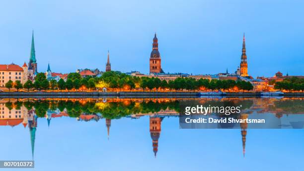 three towers of old riga, latvia - riga stock pictures, royalty-free photos & images