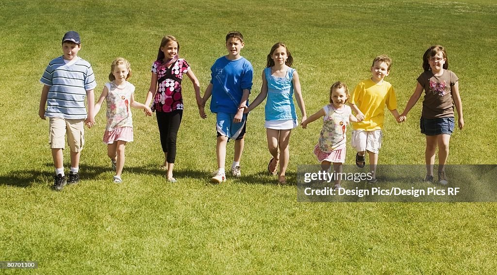 Front view of children walking