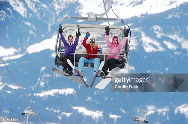 women on ski lift - woman on ski lift stock pictures, royalty-free photos & images