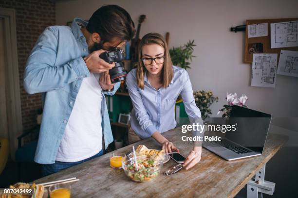 photography team at work - average photo editing by professional photographers stock pictures, royalty-free photos & images