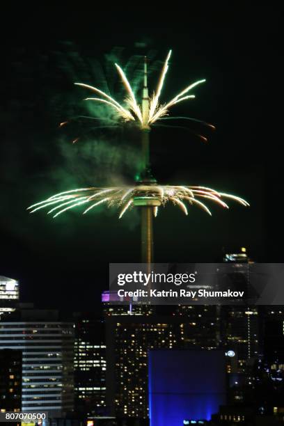 canada day fireworks. cn tower - cn tower and fireworks stock pictures, royalty-free photos & images