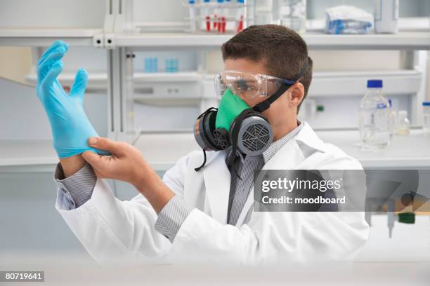 Lab Tech Goggles 322 Pulling Surgical Glove Stock Photos, High-Res Pictures, and Images ...