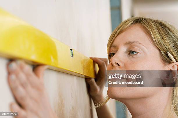 2,439 Woman Using Level Tool Stock Photos, High-Res Pictures, and ...