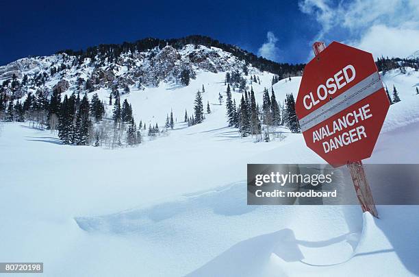 closed avalanche danger sign on slope - avalanche stock-fotos und bilder