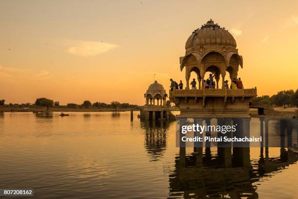 sunset view of gadisar lake in jaisalmer, rajasthan, india - jaisalmer stock pictures, royalty-free photos & images