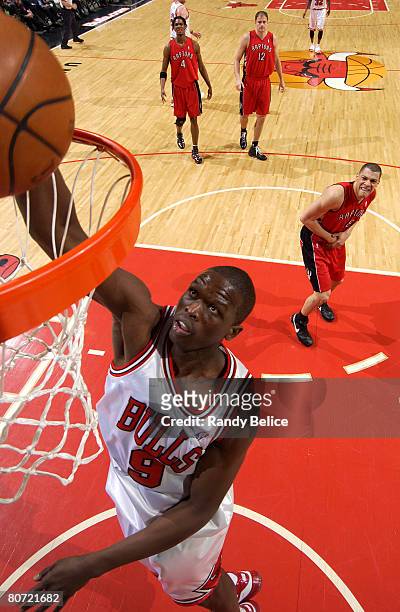 Luol Deng of the Chicago Bulls dunks against the Toronto Raptors during the game on April 16, 2008 at the United Center in Chicago, Illinois. NOTE TO...