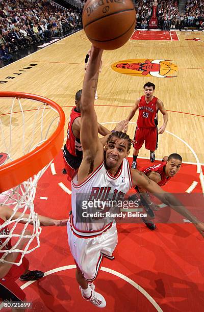 Thabo Sefolosha of the Chicago Bulls dunks against the Toronto Raptors during the game on April 16, 2008 at the United Center in Chicago, Illinois....
