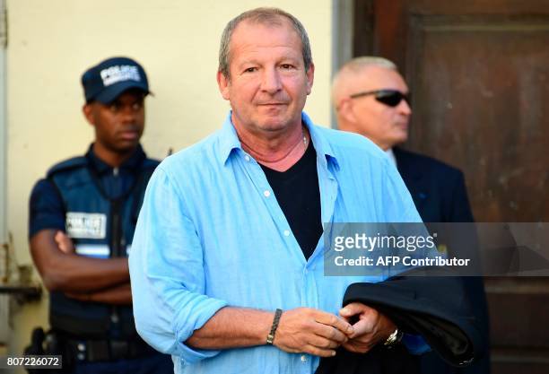 Rennes' French coach Rolland Courbis arrives for the funeral ceremony of late Montpellier's President Louis Nicollin, on July 4 at the Cathedral of...