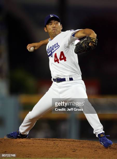 Takashi Saito of the Los Angeles Dodgers throws a pitch in the ninth inning against the Pittsburgh Pirates at Dodger Stadium on April 16, 2008 in Los...