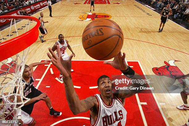 Tyrus Thomas of the Chicago Bulls goes up for the shot during the NBA game against the San Antonio Spurs on March 20, 2008 at the United Center in...