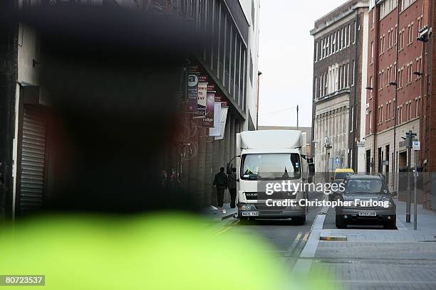 Prison van believed to contain the 17-year-old teenager accused of murdering schoolboy Rhys Jones arrives under police escort at Liverpool...