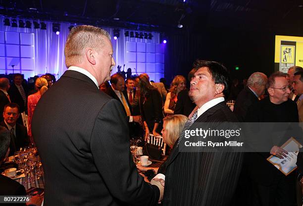 Pioneer of the Year Honoree Mike Campbell is congratulated by Will Rogers Chairman of the Board Rory Bruer at the 69th Annual Will Rogers Motion...