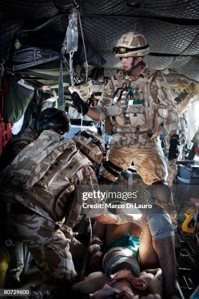 British Army Medical Emergency Response team Sgt. Mark Mitchell, British Army Anaesthetist Lt. Col. Ian Hicks, and British Army Medical Emergency...