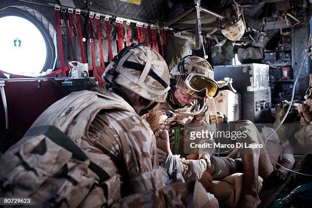 British Army Soldier from the Quick Reaction Force supporting the British Army Medical Emergency Response Team and British Army Anaesthetist Lt. Col....