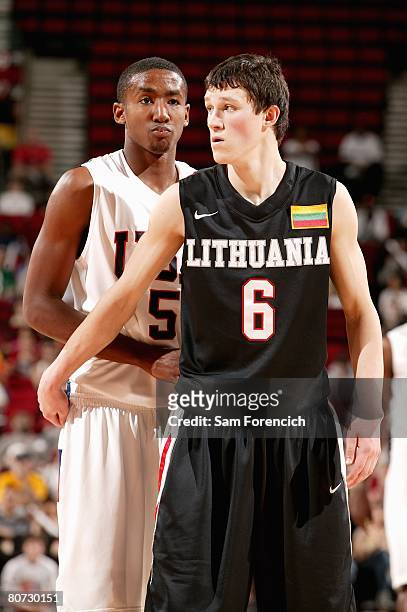 Zygimantas Janavicius of Team World guards Malcolm Lee of Team USA during the Nike Hoop Summit on April 12, 2008 at the Rose Garden in Portland,...