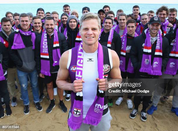 Nick Riewoldt and teammates pose for the Maddie's Match St Kilda V Richmond during a St Kilda Saints AFL media opportunity at the St Kilda Surf...