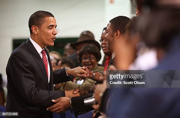 Democratic presidential candidate Senator Barack Obama greets supporters gathered for a town hall style meeting at the North Carolina State...