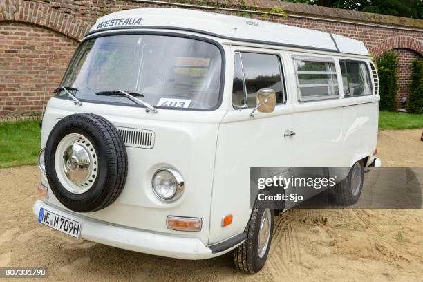 volkswagen transporter t2 camper van in a park - combi van stock pictures, royalty-free photos & images