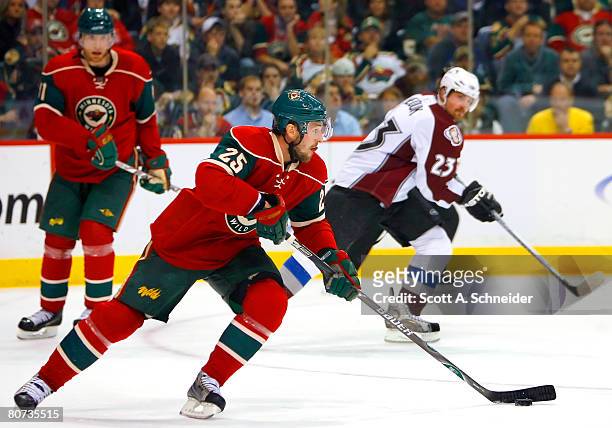 Eric Belanger of the Minnesota Wild carries the puck against the Colorado Avalanche during game five of the 2008 NHL Western Conference Quarterfinals...