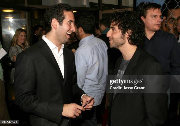 Director Hayden Schlossberg and actor David Krumholtz arrive at the "Harold and Kumar Escape from Guantanamo Bay" Premiere at the Arclight Cinerama...