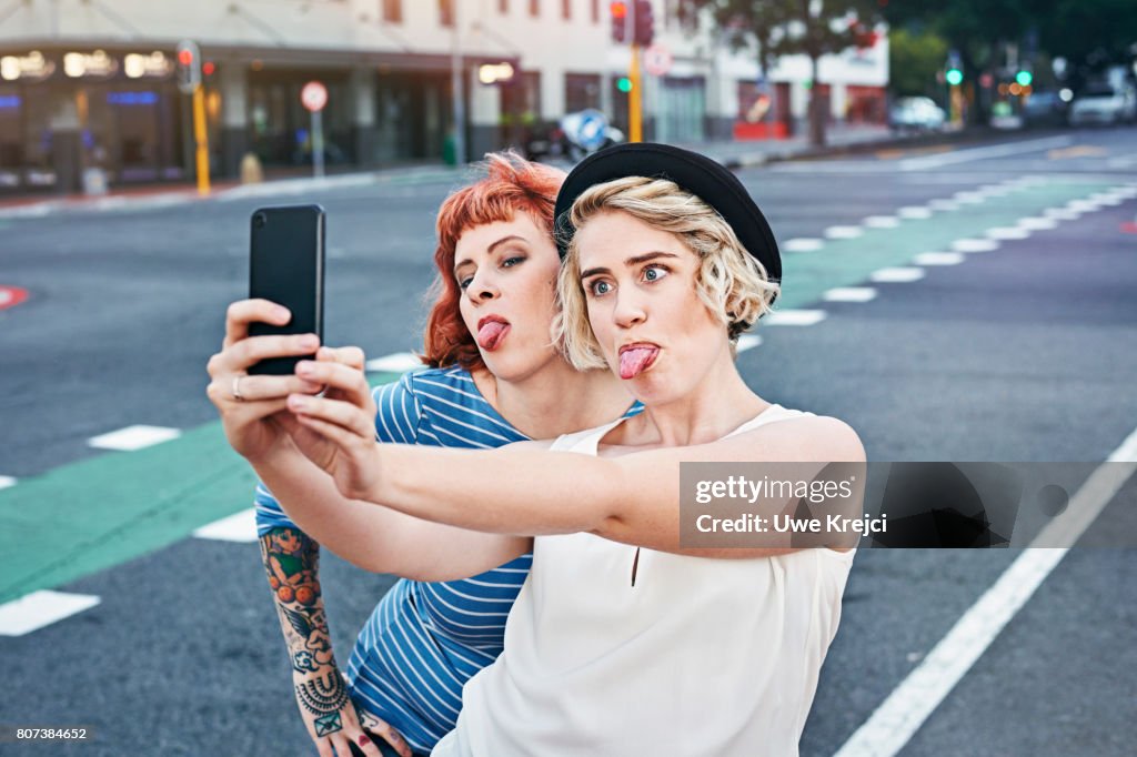 Two young women taking self portrait