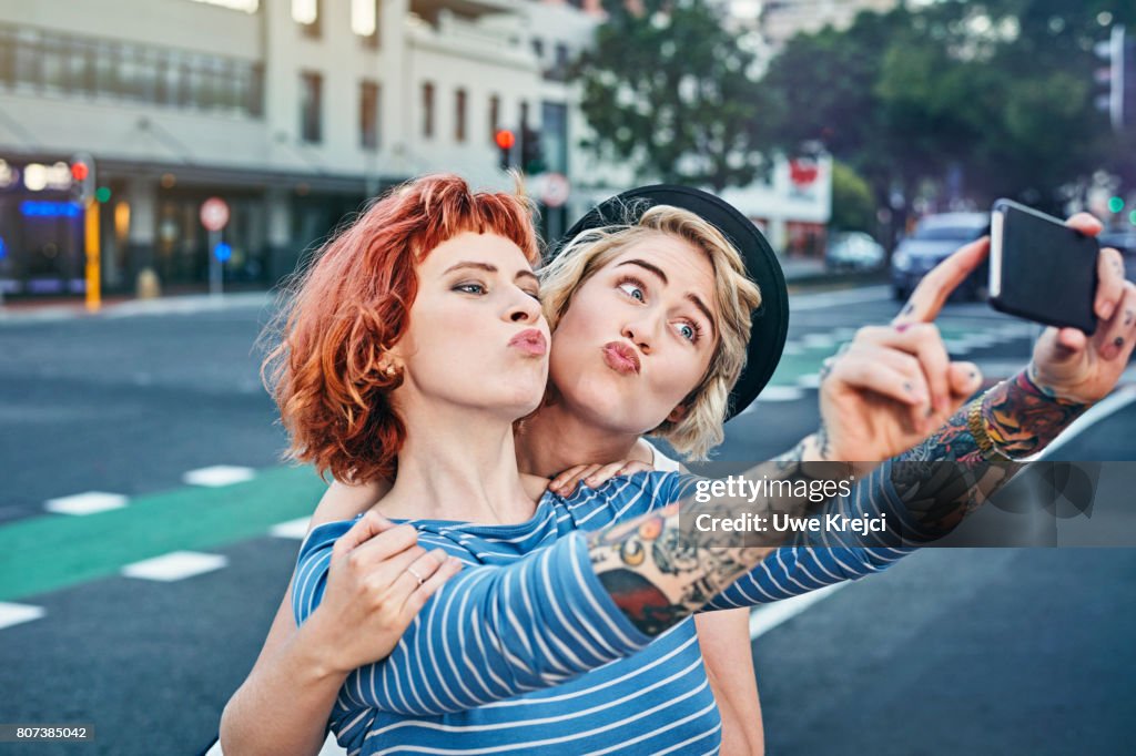 Two young women taking self portrait