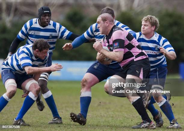 Damien Kelly of Ayr runs at the Heriot's defence during the Scottish Hydro Premier Cup Semi-Final at Millbrae, Ayr.