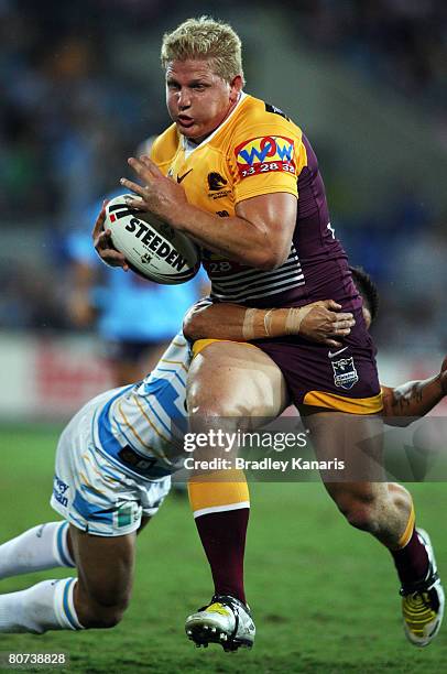 Ben Hannant of the Broncos runs the ball during the round six NRL match between the Gold Coast Titans and the Brisbane Broncos at Skilled Stadium on...