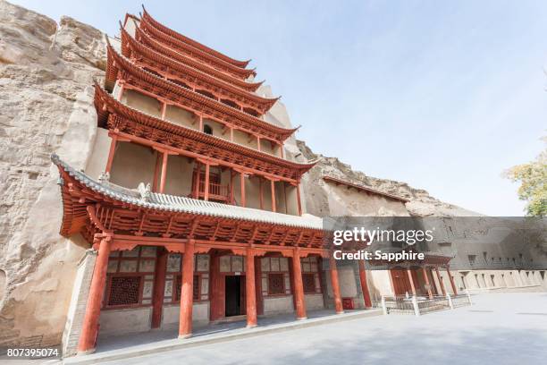 mogao grottoes in dunhuang, gansu province, china - mogao caves stock-fotos und bilder