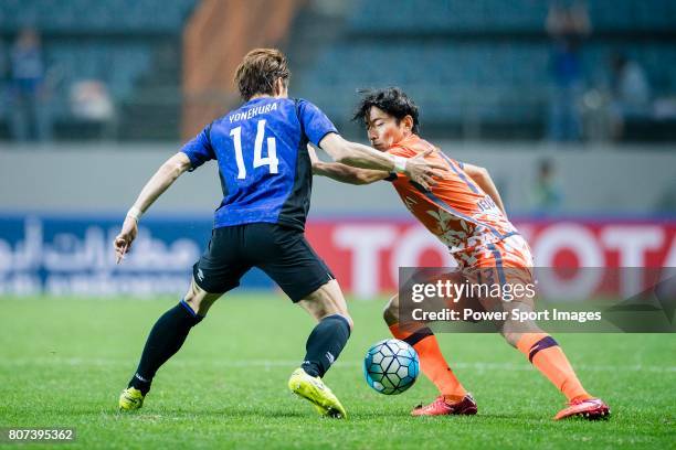 Jeju United Defender Chung Woon fights for the ball with Gamba Osaka Defender Yonekura Koki during the AFC Champions League 2017 Group H match...