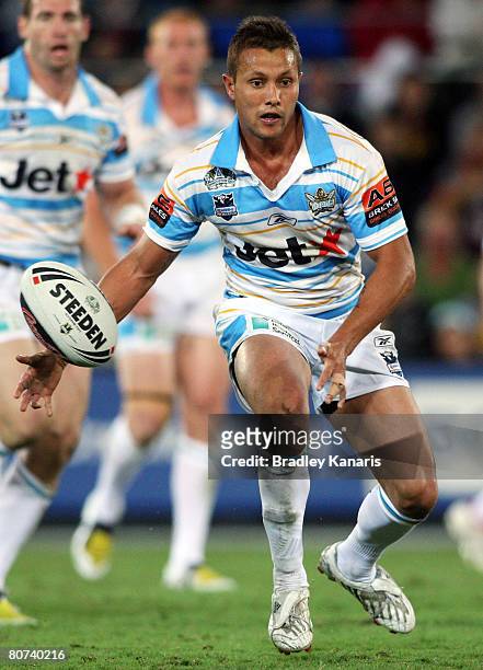 Scott Prince of the Titans passes the ball during the round six NRL match between the Gold Coast Titans and the Brisbane Broncos at Skilled Stadium...