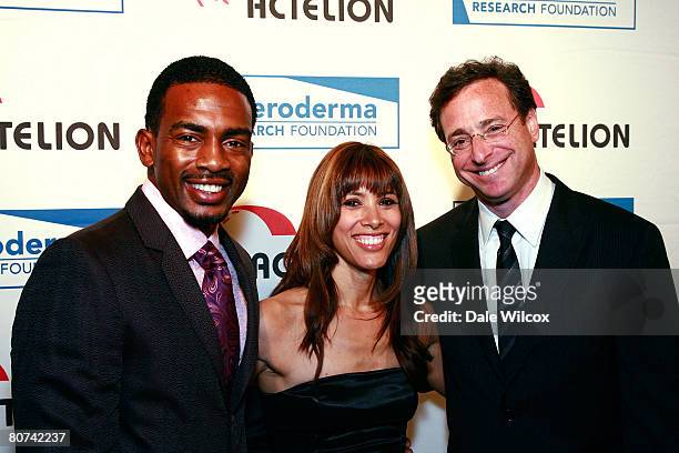 Bill Bellamy and wife, and Bob Saget attend the Cool Comedy-Hot Cuisine Benefit for the Scleroderma Research Foundation at the Four Season's Beverly...