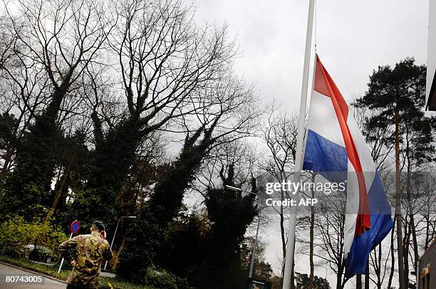 Flags fly at half-mast at a military base in Ermelo, on April 18, 2008. The son of the Netherland's newly-sworn-in army chief Peter van Uhm was...
