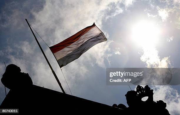 Flags fly at half-mast at a military base in Ermelo, on April 18, 2008. The son of the Netherland's newly-sworn-in army chief Peter van Uhm was...