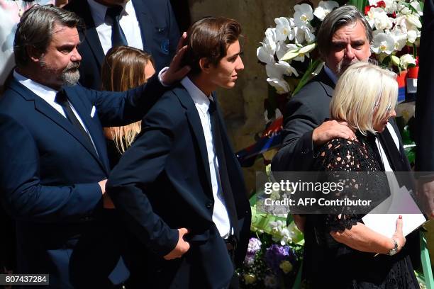 Late Montpellier's President Louis Nicollin's widow Colette Nicollin , sons Laurent and Olivier , and grandson , attend the funeral ceremony of Louis...