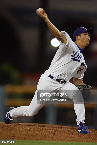 Takashi Saito of the Los Angeles Dodgers pitches against the Pittsburgh Pirates at Dodger Stadium on April 16, 2008 in Los Angeles, California.